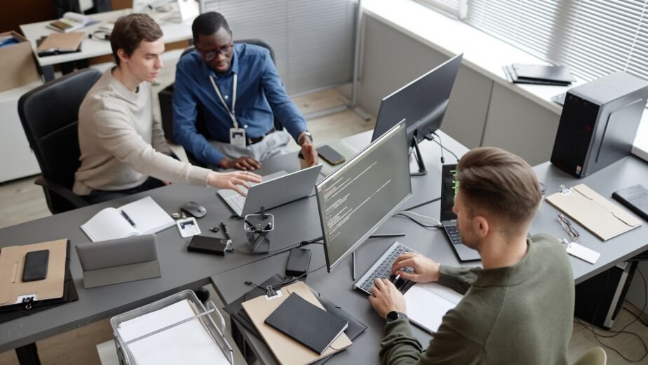 Cybersecurity Team Working on Project in Office