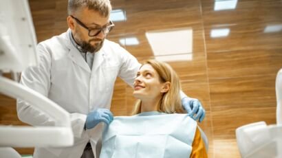 Dentist with patient at the dental office