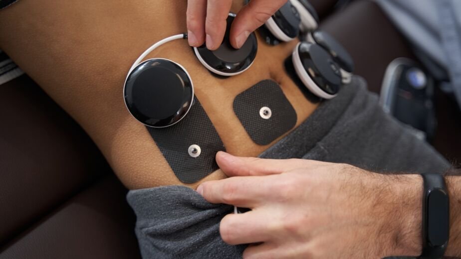 Female having therapy and rehabilitation with doctor
