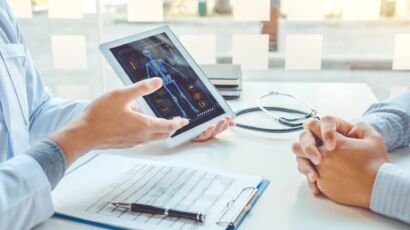 Medical technology, Doctor cardiologist discusses diagnosis with patient.