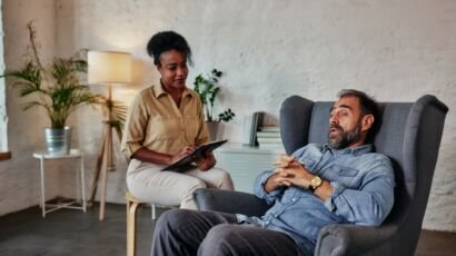 Middle age talking with mental health psychotherapist