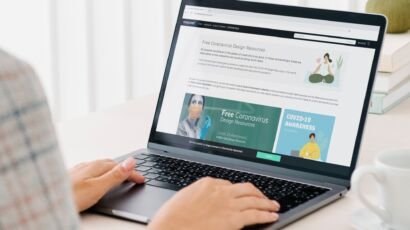 Woman checking out free design resources at a website